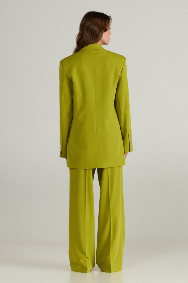 Model wearing light green cortsese linen set with blazer and high-waisted wide-leg pants.