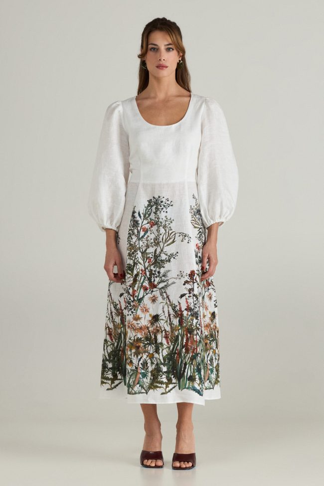 Botanica Dress by Flicka Athens - white linen midi with floral print hem and long puff sleeves