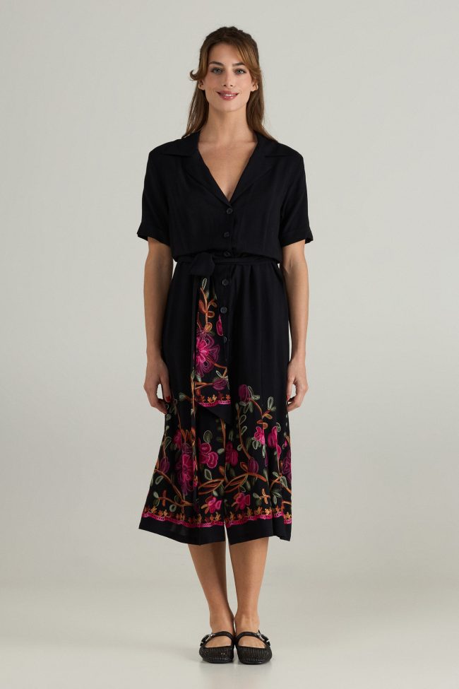 Noir Bloom Midi Dress by Flicka Athens – A black dress with buttons, a waist belt, and colorful embroidery for chic summer outfits