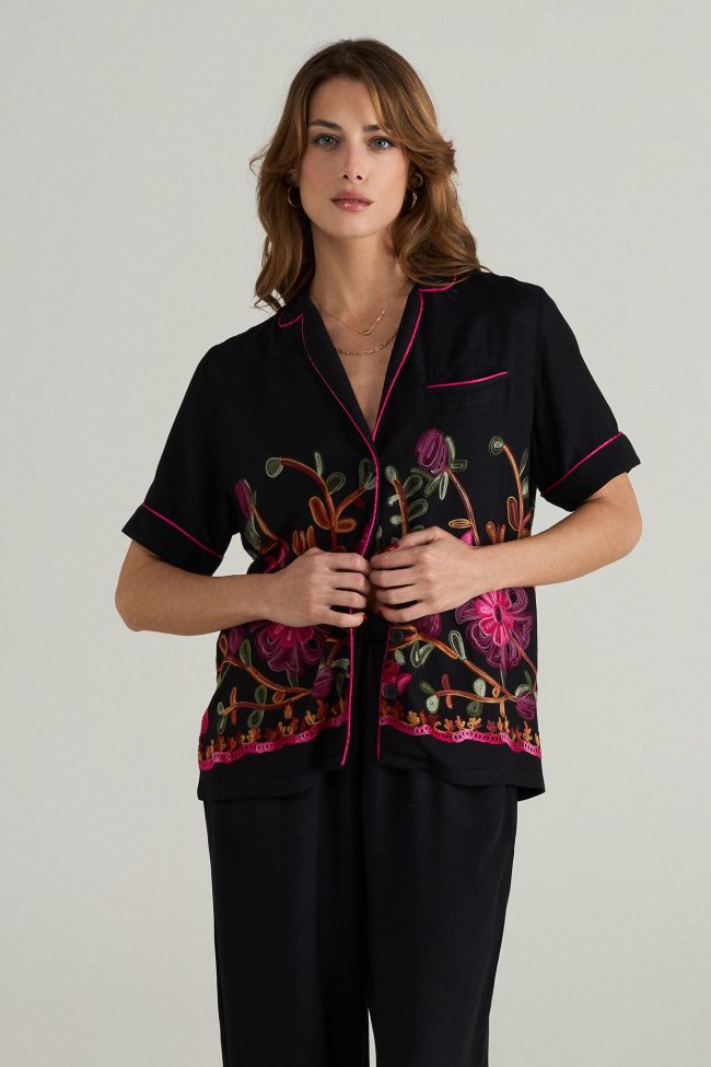 Black embroidered shirt-sleeve button-up shirt with pink piping