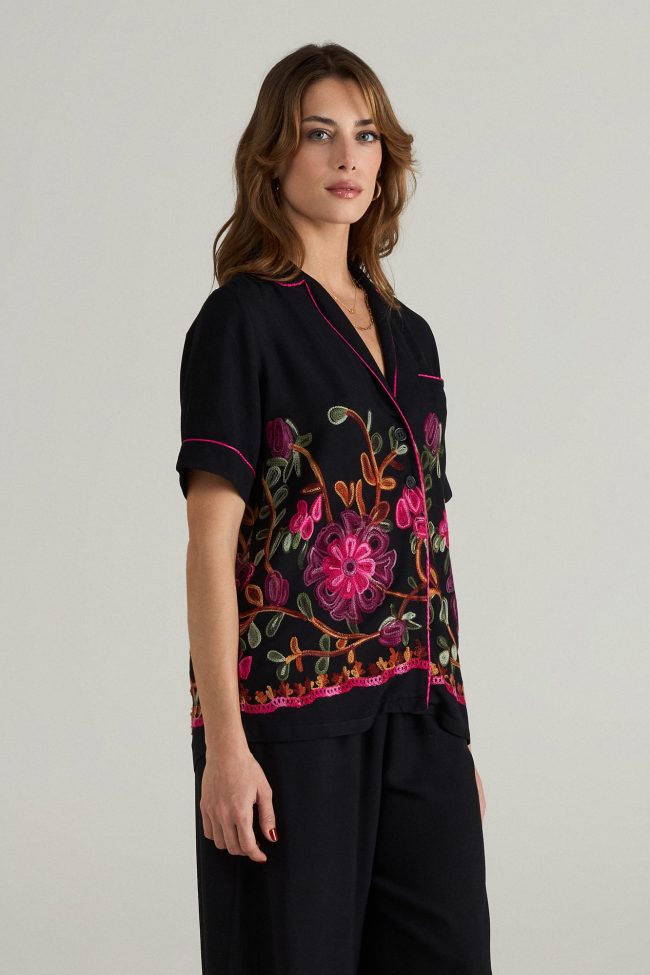 Black embroidered shirt-sleeve button-up shirt with pink piping