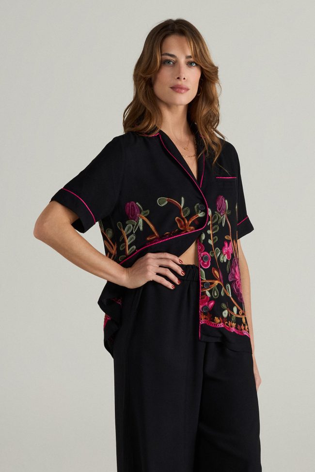 Black embroidered shirt-sleeve button-up shirt with pink piping