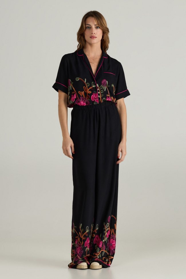 Black wide-leg trousers with floral embroidery and elastic waistband