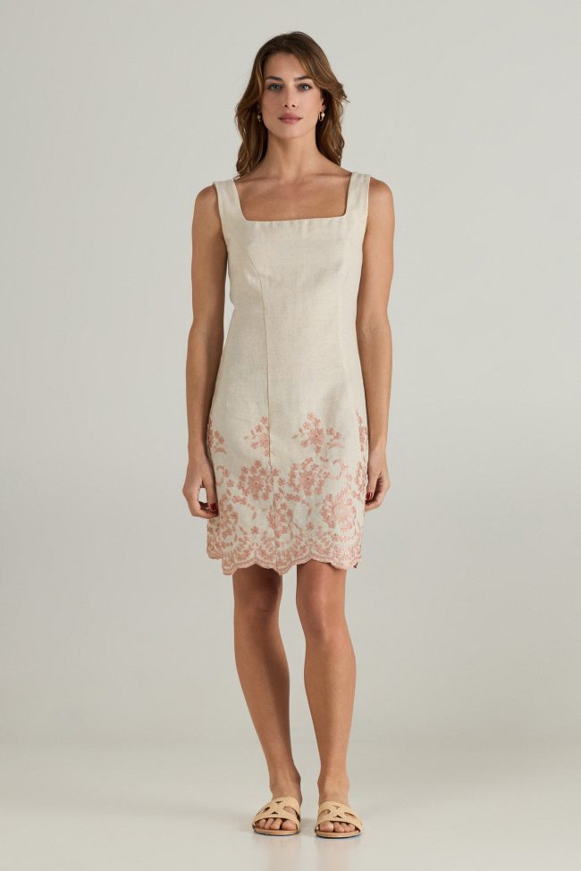 Celeste Embroidered Linen Dress – Sleeveless beige linen dress with intricate blush embroidery and a scalloped hem for a timeless feminine look.