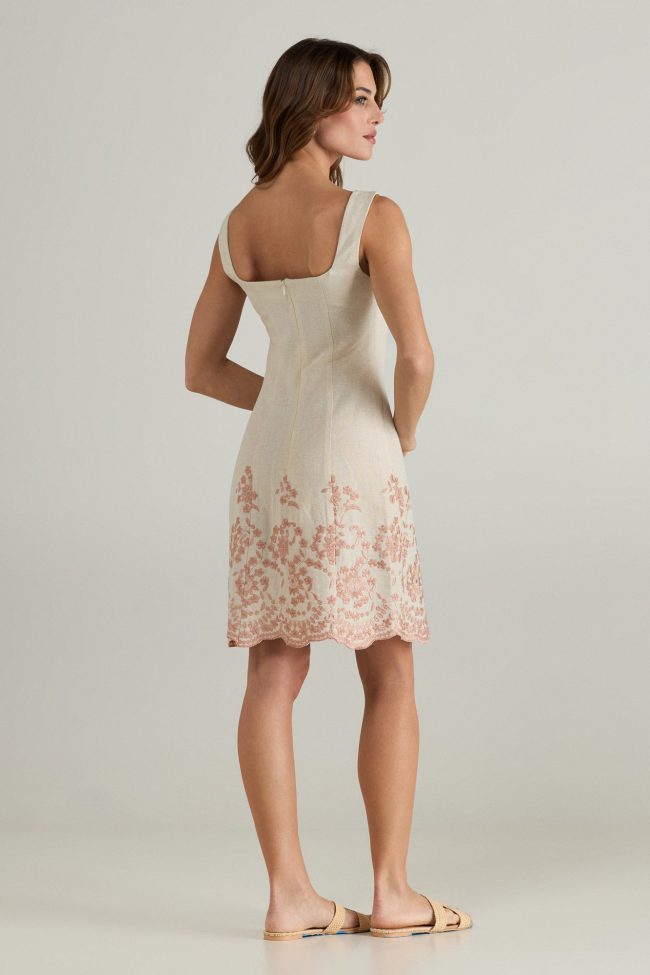Celeste Embroidered Linen Dress – Sleeveless beige linen dress with intricate blush embroidery and a scalloped hem for a timeless feminine look.